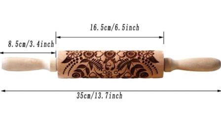Rolling pin for embossing clay or fondant
